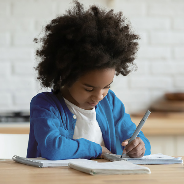 Child Focused Doing Homework